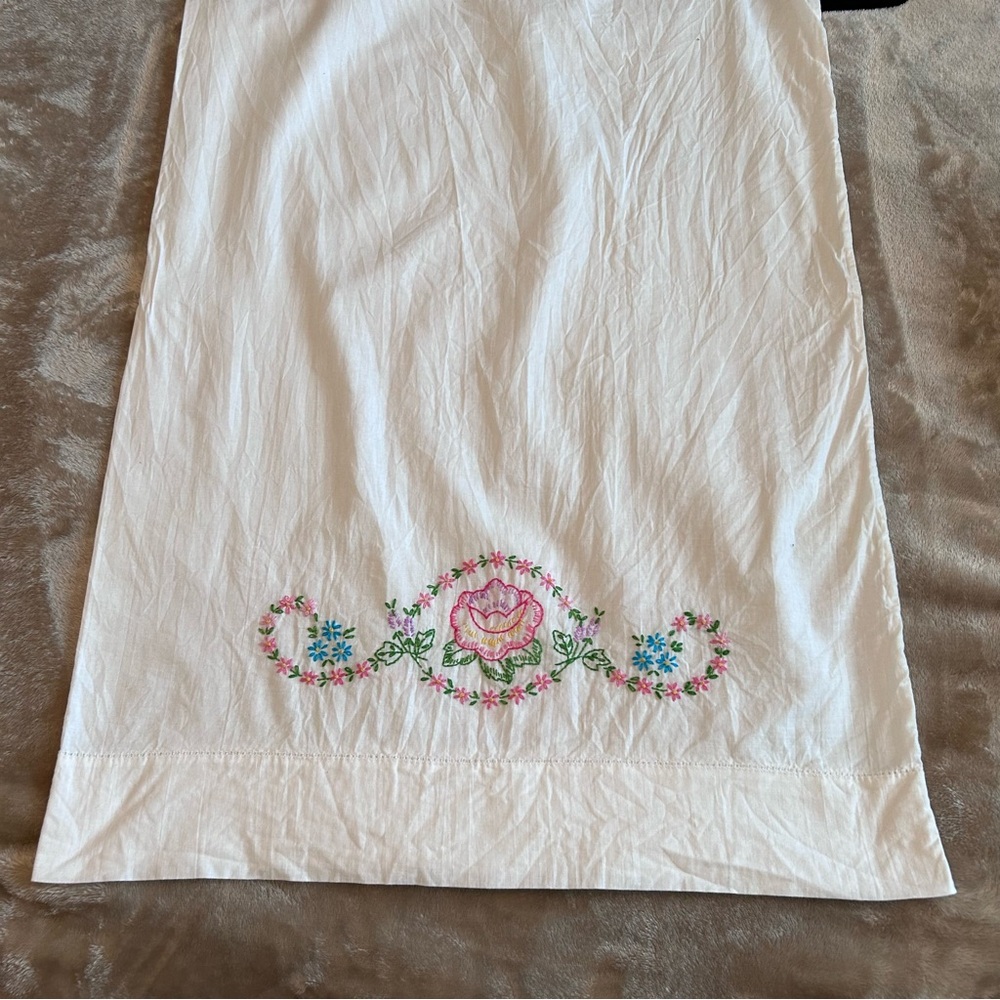 Hand embroidered pillow case
